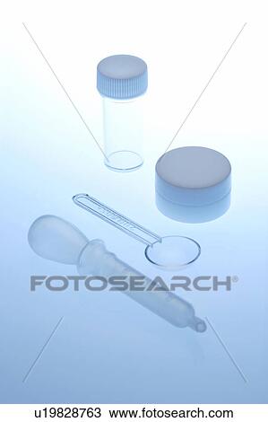 Stock Image - Laboratory equipment, blue background. Fotosearch