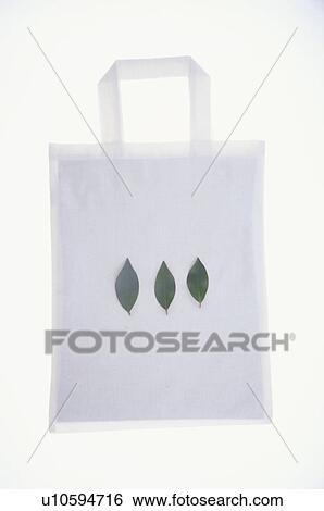 Stock Photograph - Leaves on side of eco-friendly bag. Fotosearch