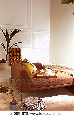 Living room with brown chaise longue View Large Photo Image Stock Photo - Living room with brown chaise longue. Fotosearch