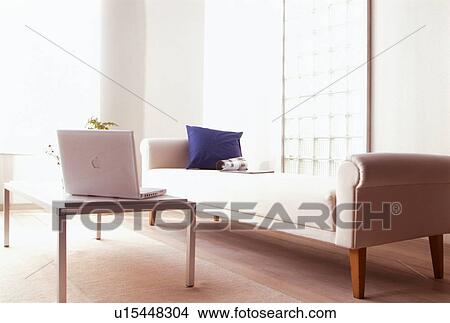 Picture - Living room with chaise longue and coffee table. Fotosearch