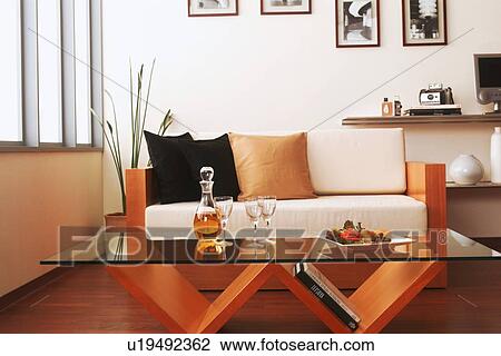 Living room with modern coffee table View Large Photo Image Stock Image - Living room with modern coffee table. Fotosearch