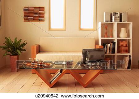 Stock Image - Living room with modern coffee table. Fotosearch
