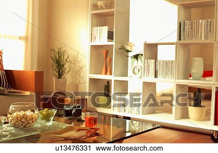 Living room with shelves and coffee table View Large Photo Image Stock Image - Living room with shelves and coffee table. Fotosearch