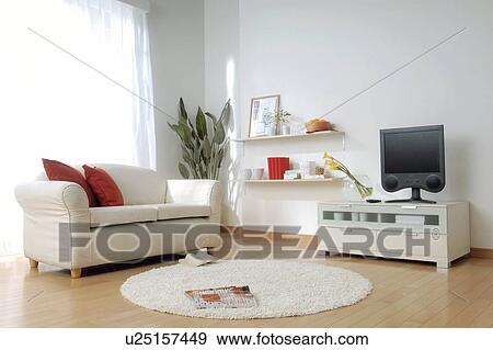 Living room with sofa and television View Large Photo Image Stock Photo - Living room with sofa and television. Fotosearch