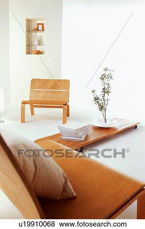 Stock Photo - Living room with wooden chairs and coffee table. Fotosearch