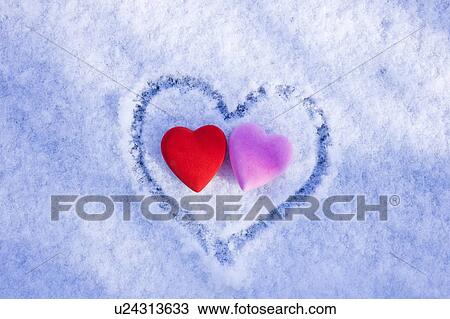 Stock Image - Lovehearts in the Snow. Fotosearch