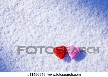 Stock Photo - Lovehearts on the Snow. Fotosearch