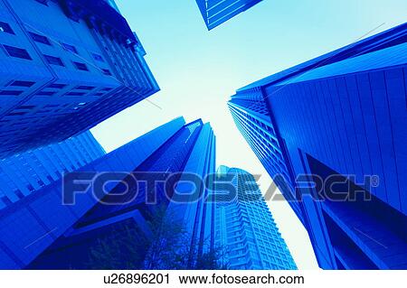 Stock Image - Low Angle view of skyscrapers, Kita-ku, Osaka Prefecture, Japan. Fotosearch
