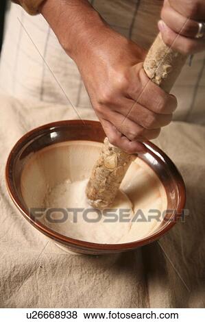 Man grinding Chinese yam View Large Photo Image Stock Photo - Man grinding Chinese yam. Fotosearch