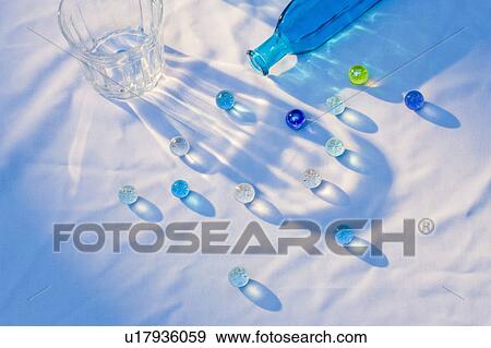 Marbles on white cloth View Large Photo Image Stock Photo - Marbles on white cloth. Fotosearch