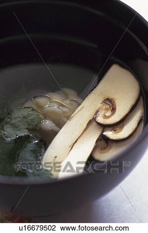 Stock Image - Matsutake mushroom soup. Fotosearch