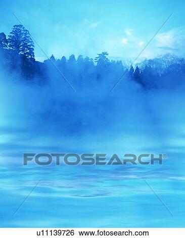 Mist over water with trees in background View Large Photo Image Stock Photograph - Mist over water with trees in background. Fotosearch