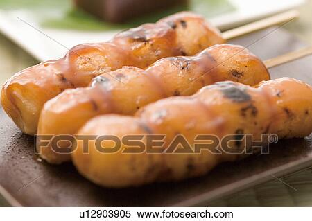 Stock Photography - Mitarashi dango. Fotosearch
