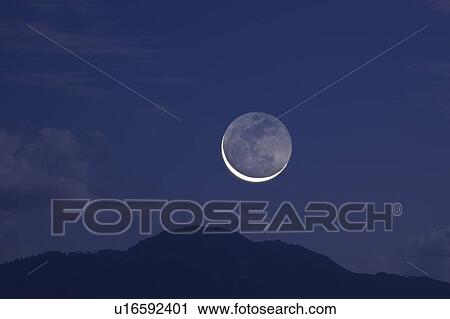 Stock Image - Moon in the Night Sky. Fotosearch