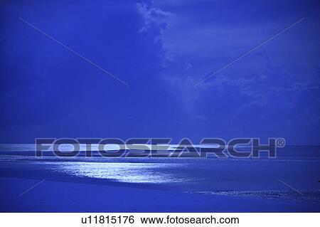 Moonlight reflecting on sea off the shore, Maldive Islands View Large Photo Image Stock Photograph - Moonlight reflecting on sea off the shore, Maldive Islands. Fotosearch