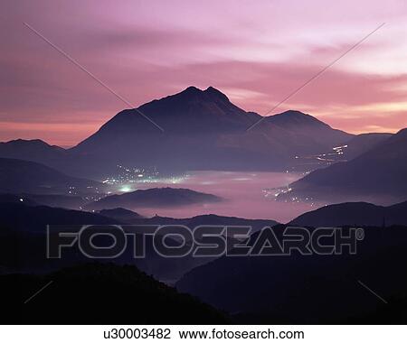 Stock Image - Morning Glow Over Mountains. Fotosearch