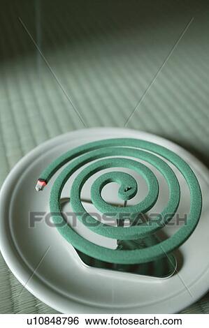 Stock Photograph - Mosquito coil. Fotosearch