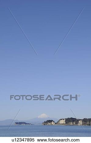 Stock Photography - Mt Fuji and Enoshima Island viewed from Kamakura. Enoshima, Kamakura, Kanagawa Prefecture, Japan. Fotosearch