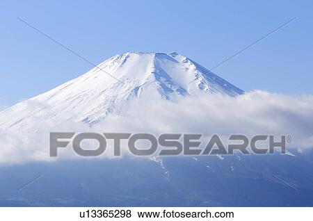 Stock Photo - Mt. Fuji covered in snow. Yamanakako, Yamanashi Prefecture, Japan. Fotosearch