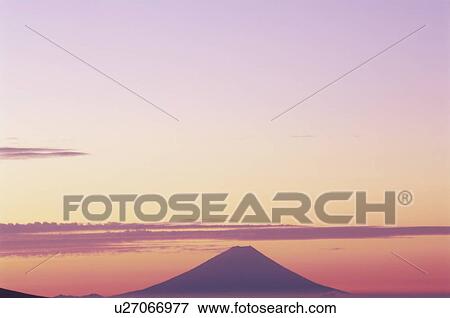 Stock Photo - Mt. Fuji during beautiful sunrise. Kirigamine, Japan. Fotosearch