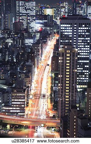 Office buildings and streets in the night, long exposure, Tokyo prefecture, Japan View Large Photo Image Stock Photo - Office buildings and streets in the night, long exposure, Tokyo prefecture, Japan. Fotosearch
