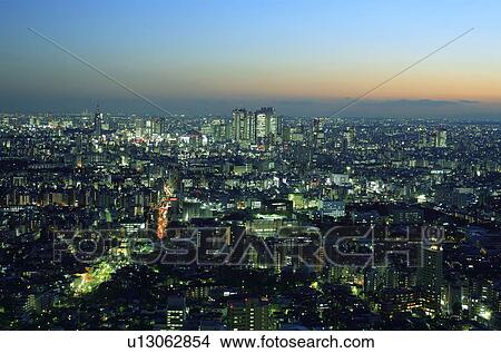 Picture - Office buildings in the night, long exposure, Tokyo prefecture, Japan. Fotosearch