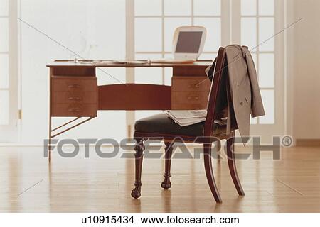 Picture - Old-fashioned office with modern laptop. Fotosearch