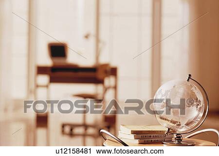 Stock Image - Old-fashioned office with modern laptop. Fotosearch