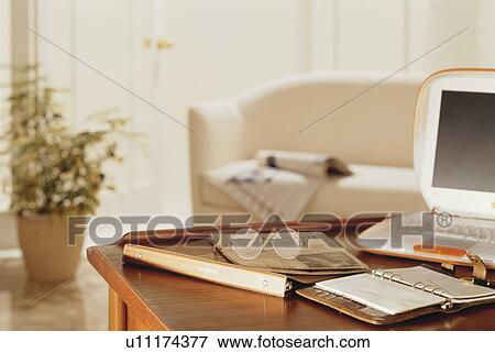 Stock Photo - Old-fashioned office with modern laptop. Fotosearch