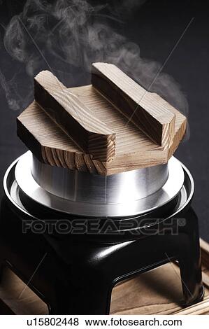 Stock Photo - Old fashioned rice cooker. Fotosearch