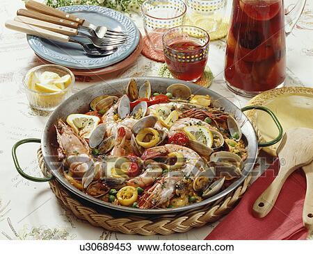 Paella and sangria View Large Photo Image Stock Image - Paella and sangria. Fotosearch
