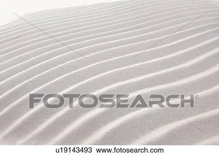 Stock Image - Patterns in sand, close-up. Fotosearch