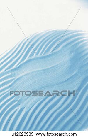 Stock Photo - Patterns in sand, close-up. Fotosearch