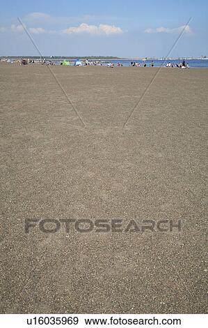 Stock Photo - People in the beach, copy space, Tokyo prefecture, Japan. Fotosearch