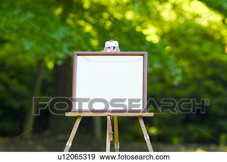 Stock Photo - Picture frame on easel. Fotosearch