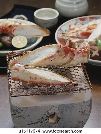 Pieces of crab on grill View Large Photo Image Picture - Pieces of crab on grill. Fotosearch
