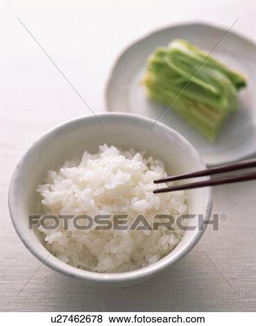 Stock Photo - Plain boiled rice and pickled vegetable. Fotosearch