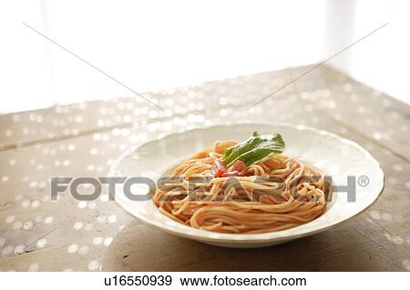Stock Photo - Plate of spaghetti with tomato sauce. Fotosearch