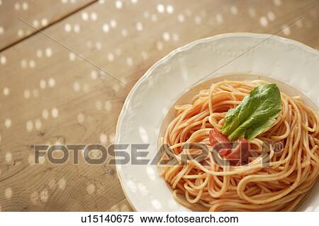 Plate of spaghetti with tomato sauce View Large Photo Image Stock Photography - Plate of spaghetti with tomato sauce. Fotosearch