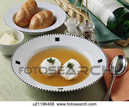 Poached Egg and Consomme Soup View Large Photo Image Stock Photo - Poached Egg and Consomme Soup. Fotosearch