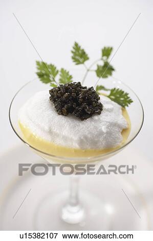 Poached egg with caviar, salmon and cream fraiche View Large Photo Image Stock Photo - Poached egg with caviar, salmon and cream fraiche. Fotosearch