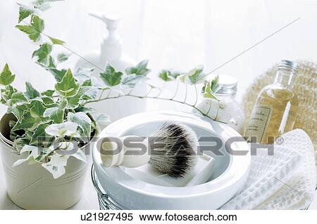 Stock Photography - Potted plant and toiletries. Fotosearch