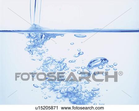 Pouring water, close up, white background View Large Photo Image Stock Image - Pouring water, close up, white background. Fotosearch