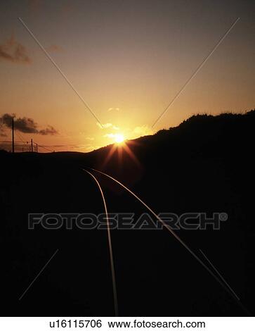Stock Photograph - Railway Track and Sun. Fotosearch