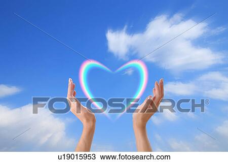 Stock Image - Rainbow in the Shape of a Heart. Fotosearch