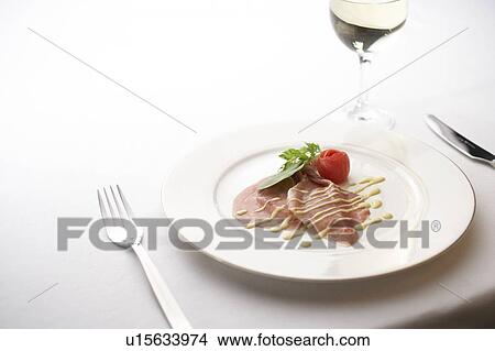 Raw ham carpaccio with sauce View Large Photo Image Picture - Raw ham carpaccio with sauce. Fotosearch