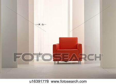 Red armchair in white room View Large Photo Image Stock Photo - Red armchair in white room. Fotosearch