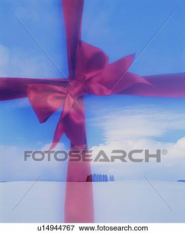 Red bow over snowy landscape View Large Photo Image Stock Photo - Red bow over snowy landscape. Fotosearch
