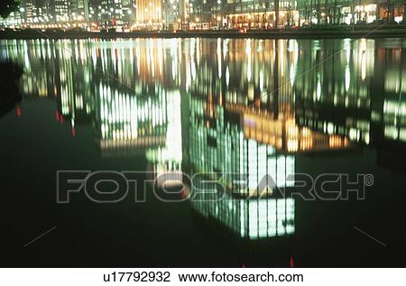 Reflection of Buildings in Water. Chiyoda-ku, Tokyo, Japan View Large Photo Image Stock Image - Reflection of Buildings in Water. Chiyoda-ku, Tokyo, Japan. Fotosearch