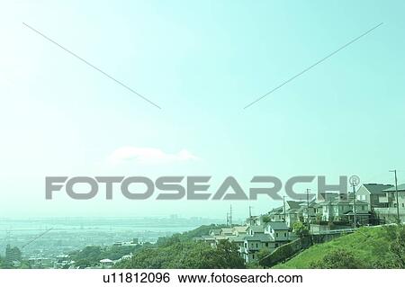 Stock Photograph - Residential House on Hill. Fotosearch